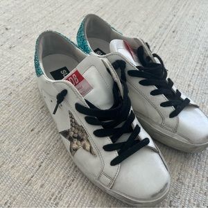 Golden goose sneakers only worn a handful of times.